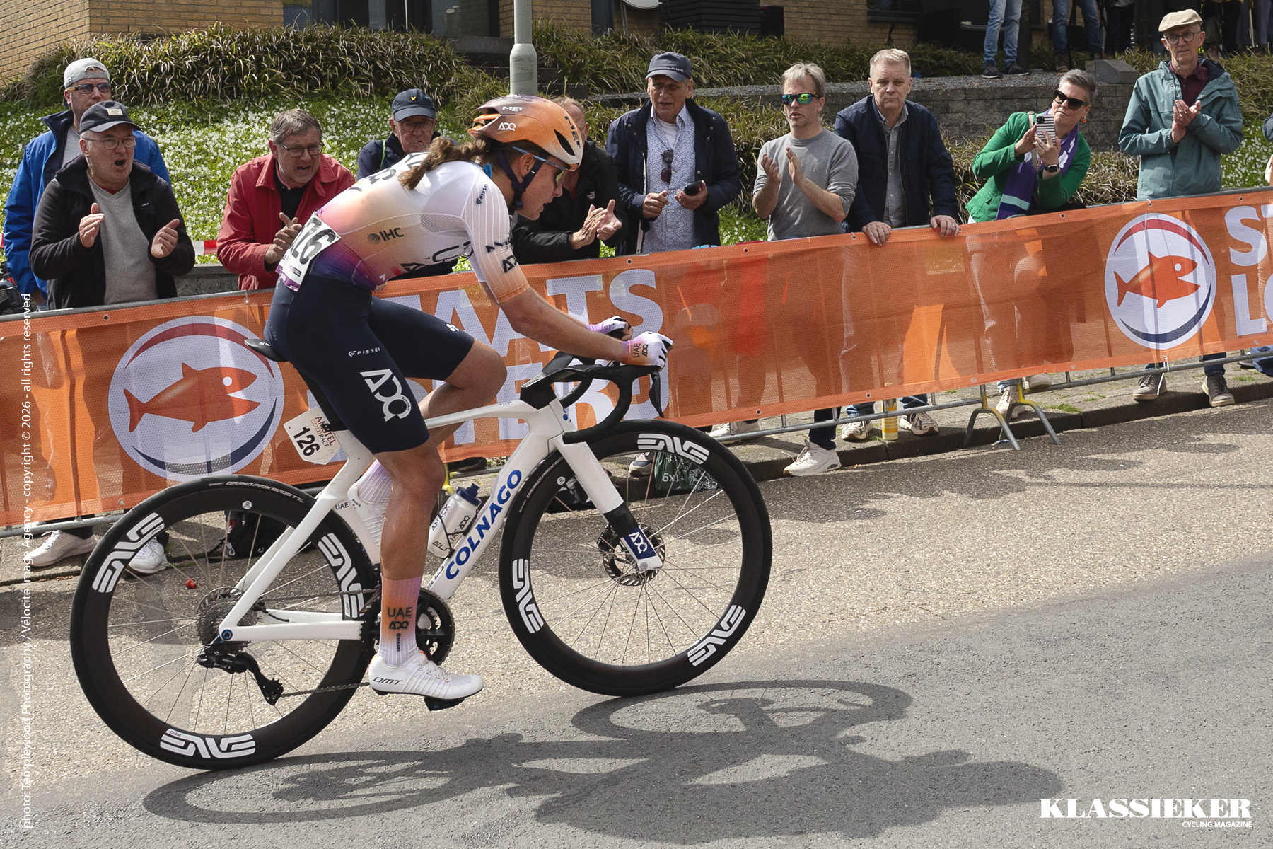Alt Tag - Paula Blasi of UAE Team ADQ climbs Geulhemmerberg during Amstel Gold 2026 roared on by roadside suporters