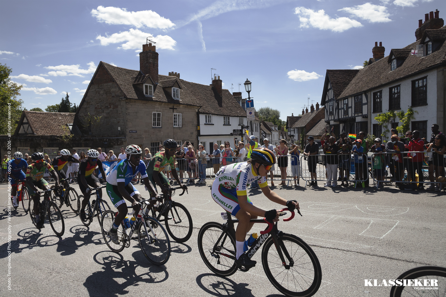 Birmingham 2022 - Riders race past historic cottages in Warwick