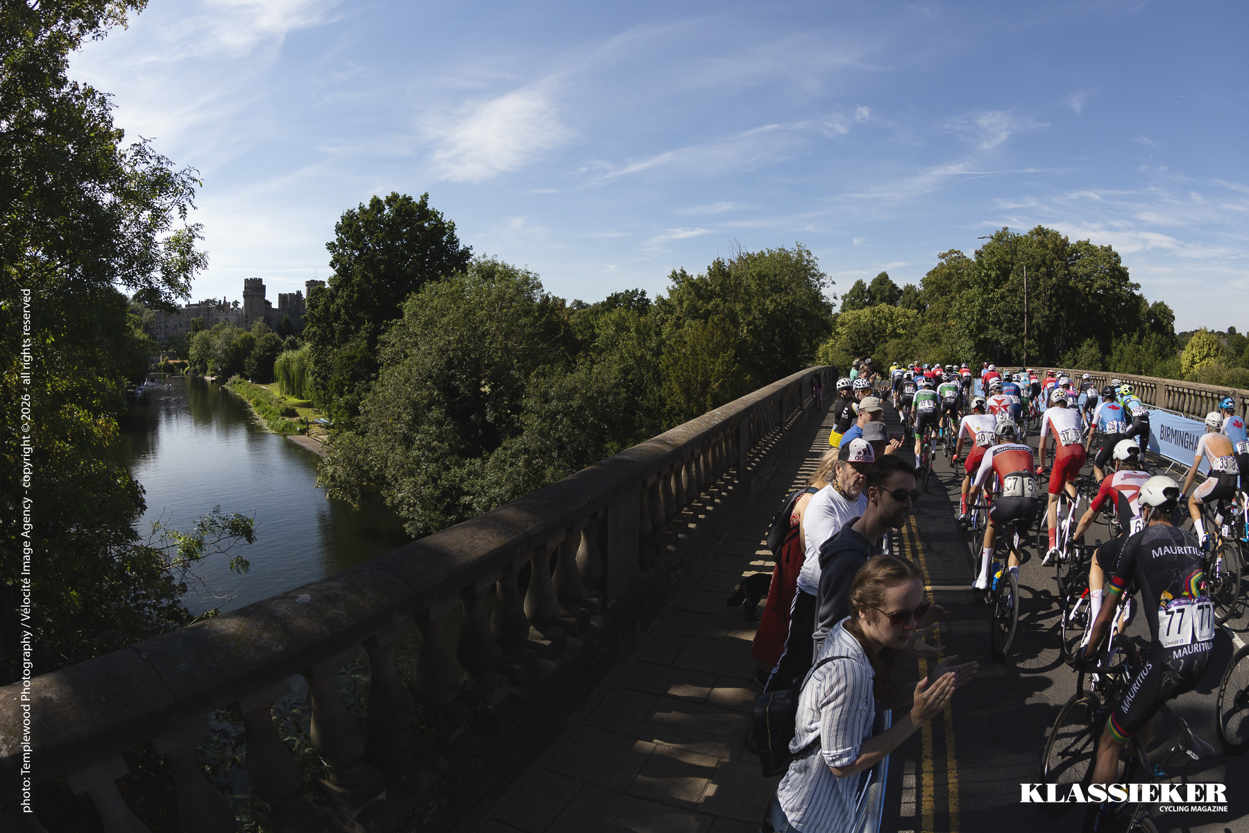 Birmingham 2022 - the race crosses over a river with a view of Warwick Caste in the background