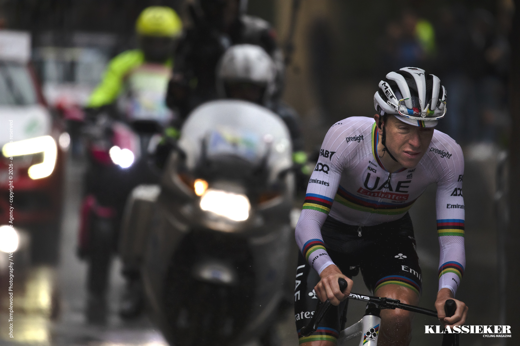 Giro dell’Emilia 2024 - Tadej Pogačar, eyes swollen with the dirt from the road, squints as he makes his way towards the San Luca climb