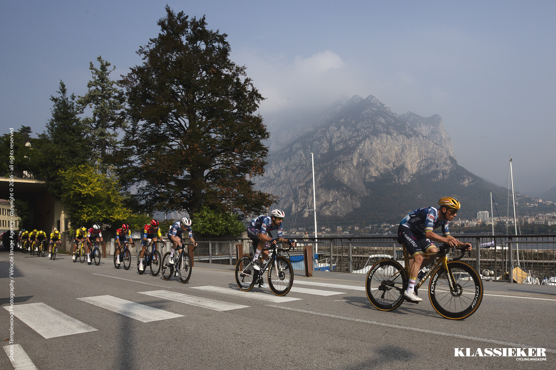 Il Lombardia 2025 - Remco Evenepoel races through Malgrate along the shores of Lago di Lecco
