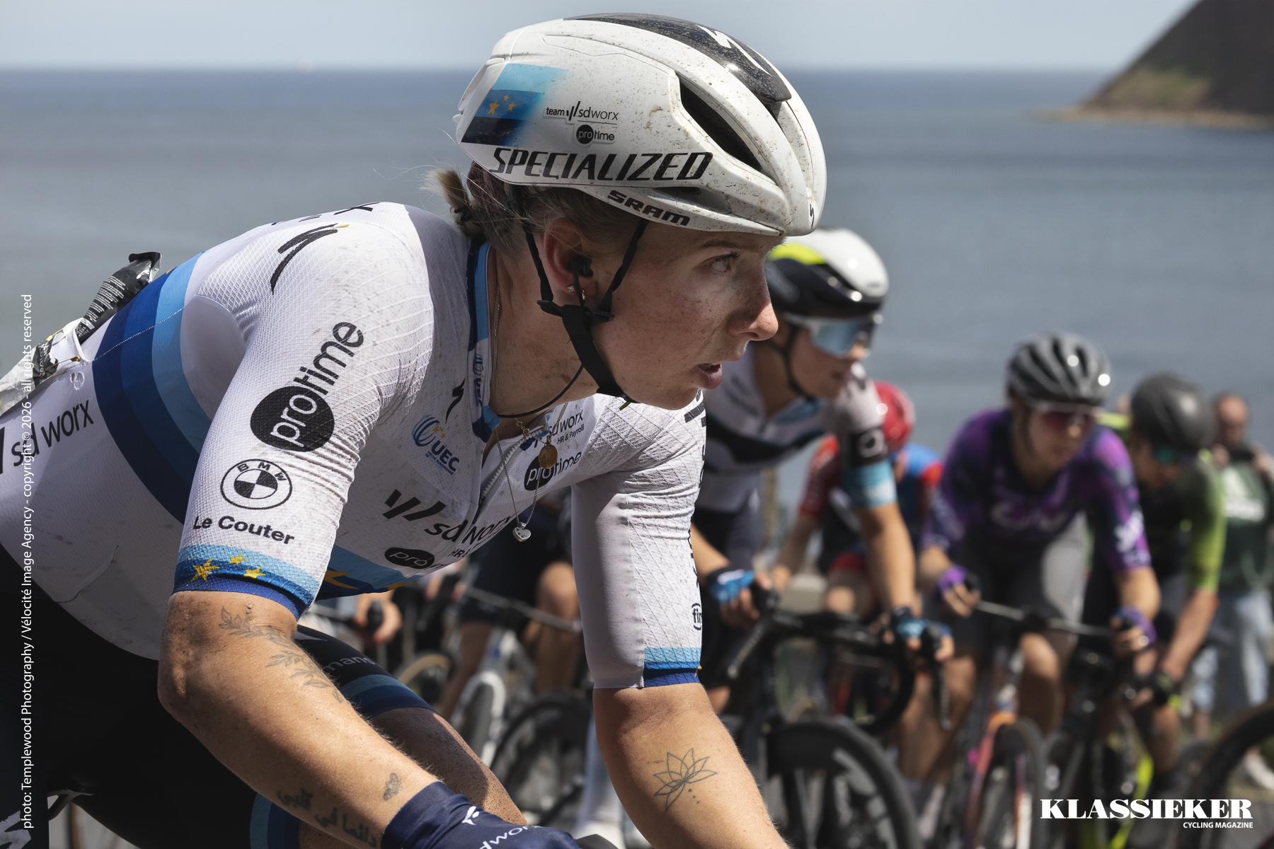 Tour of Britain Women 2025 - A close up of Lorena Wiebes on a climb with the sea in the background